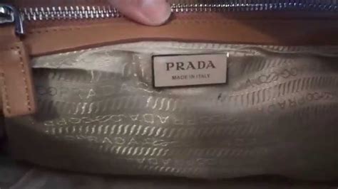 how do you tell if a prada purse is real|how to identify prada purses.